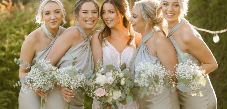 Bride and bridesmaids with bouquets